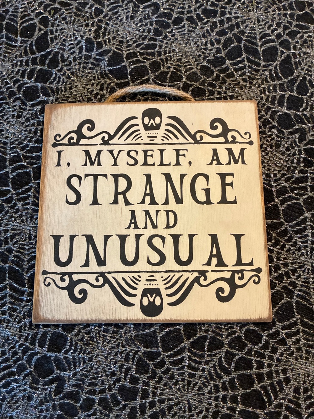 Hand Crafted Beige and Black "I, Myself, Am Strange and Unusual" Wooden Sign